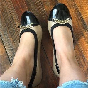 Black and nude flats